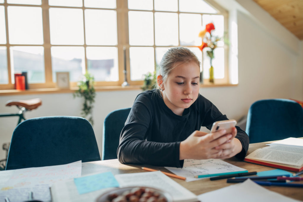 Where kids are exposed to porn and how they should respond-Tween Girl On Phone