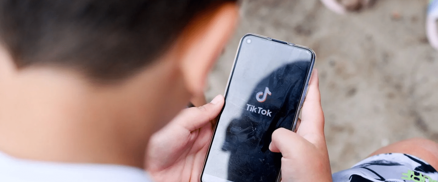 person using tiktok image