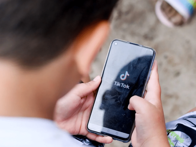 person using tiktok image